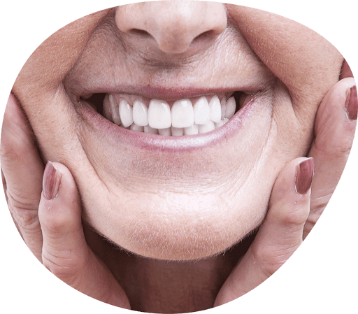 Woman wearing her new dental implants