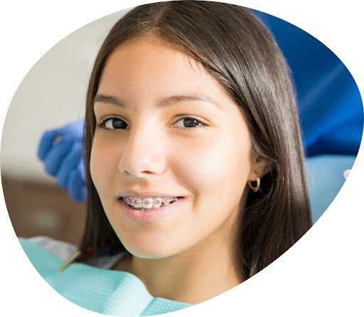 Girl wearing metal braces with orthodontically shaped face